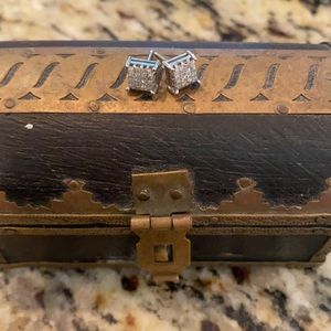 One pair 14 karat white gold studs